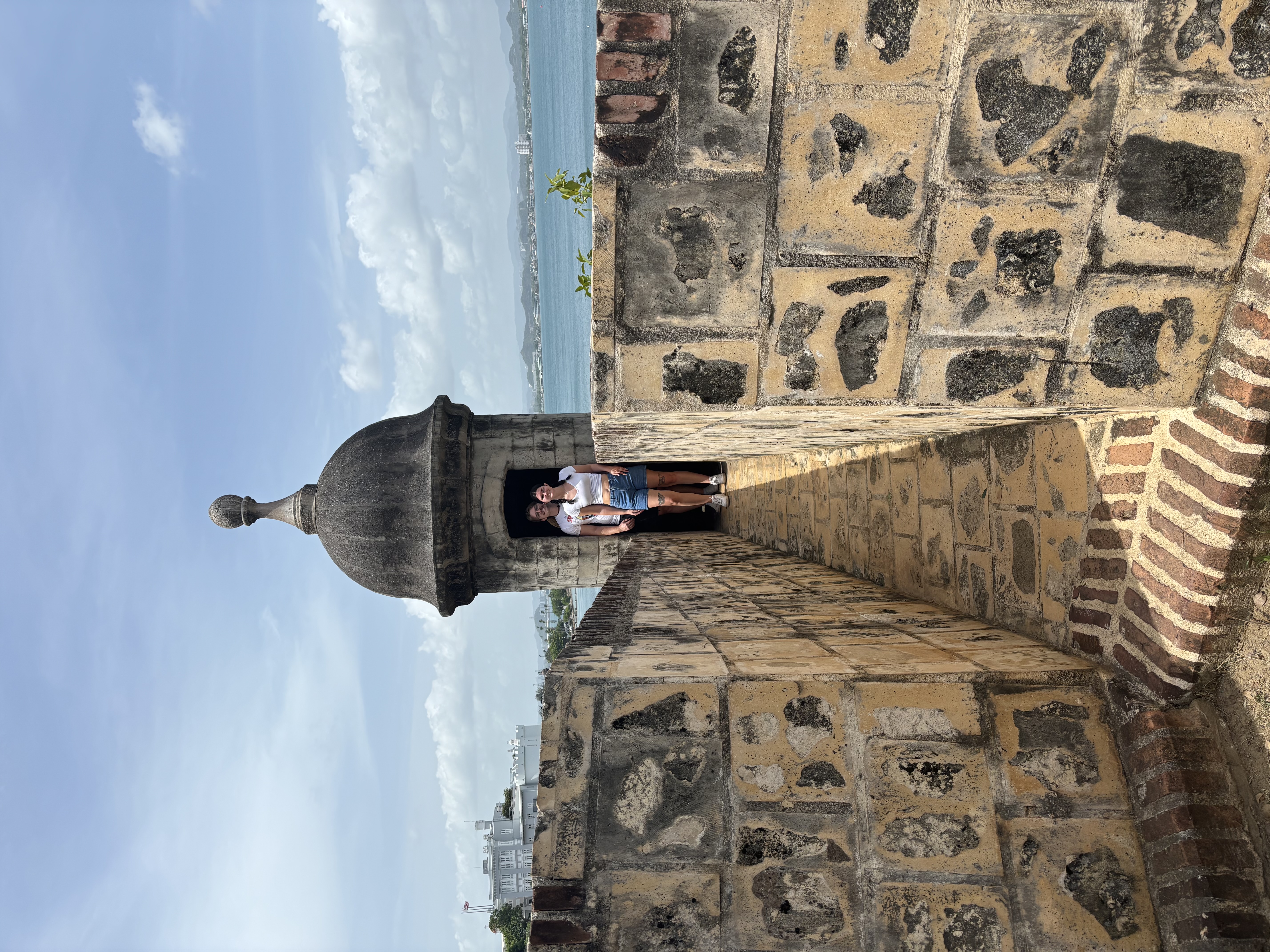 My wife exploring a seaside fort in Puerto Rico